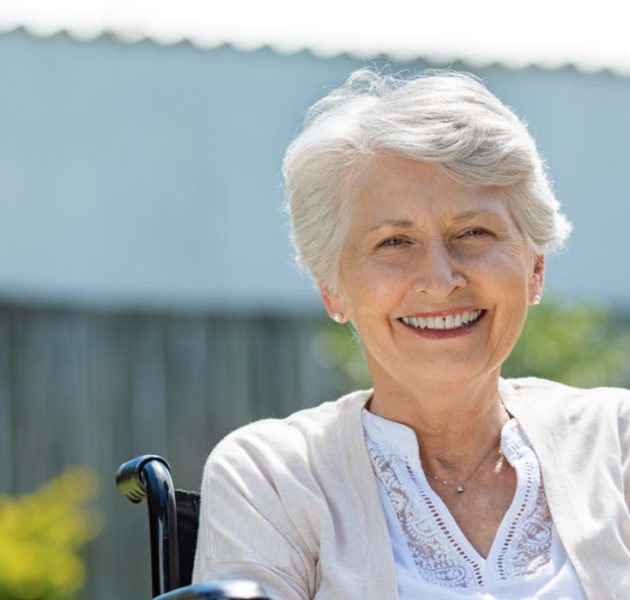 Happy senior women in wheelchair